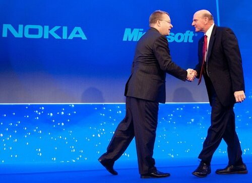 Nokia Chief Executive Stephen Elop (L) s